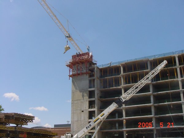<p><strong><span style="font-family: Times New Roman; font-size: small;">Tower Crane  placing Concrete at the Climbing Form System for Elevator Core Walls</span> <br /></strong></p>